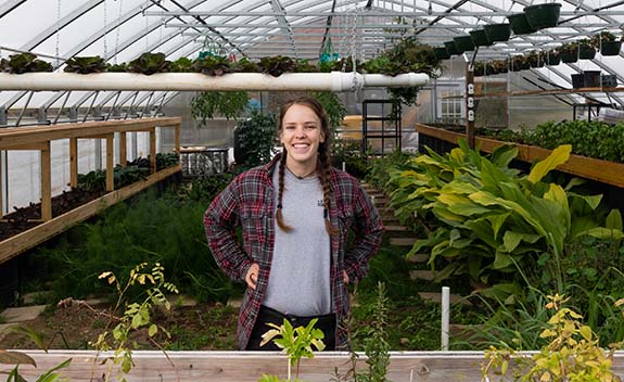 Tyree at the SD Farm greenhouse