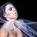 Photograph of woman in a veil.