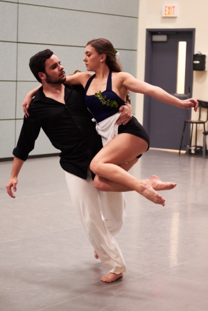 A male and female dancer perform