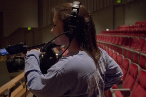 Student with video camera