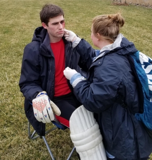 Student with simulated facial injury