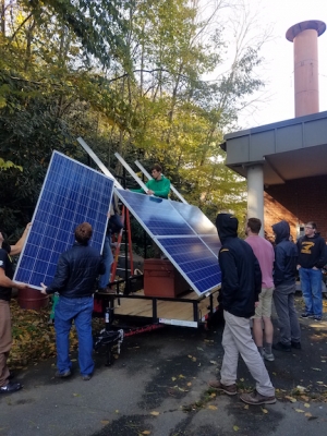 Students mount solar array