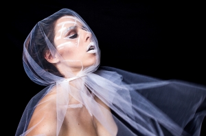 Photograph of woman in a veil.