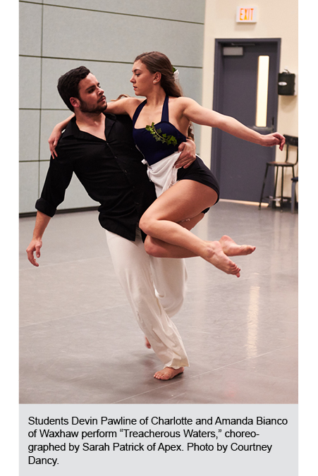 A male and female dancer perform